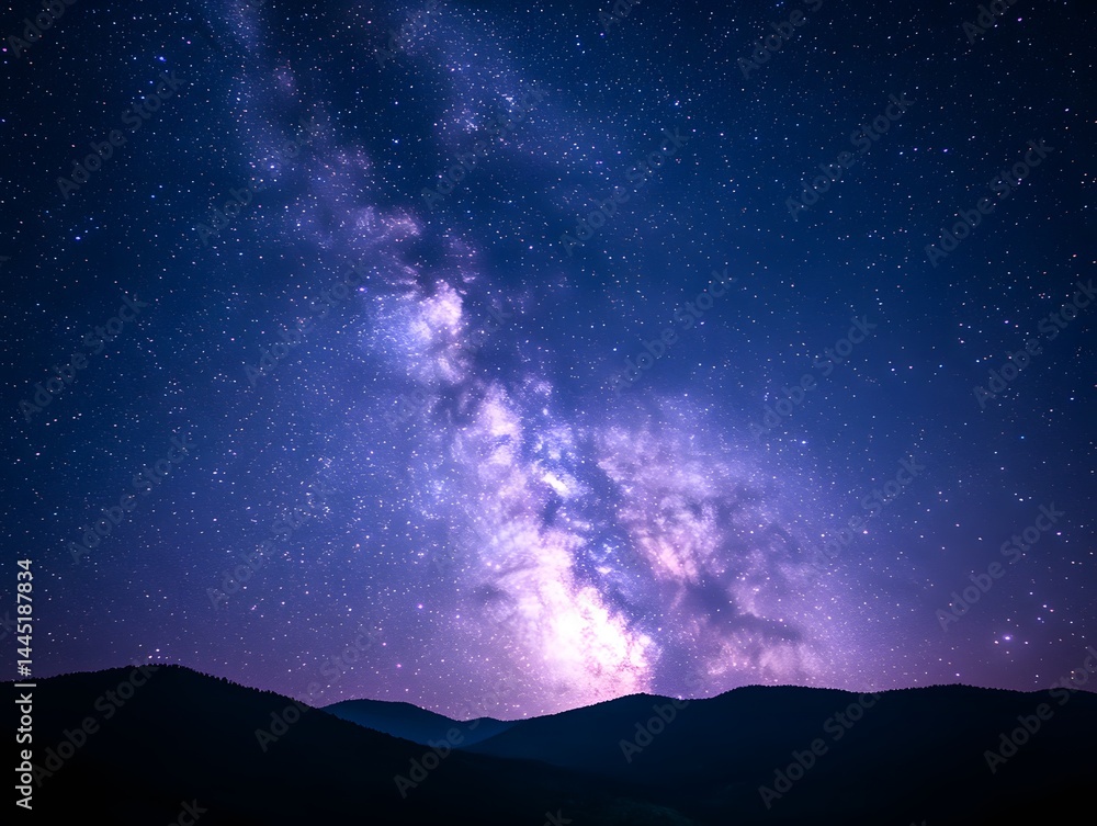 Majestic Milky Way Galaxy over Silhouetted Mountain Range at Night A breathtaking view of stars and cosmos Majestic Milky Way Galaxy over Silhouetted Mountain Range at Night A breathtaking view of stars and cosmos