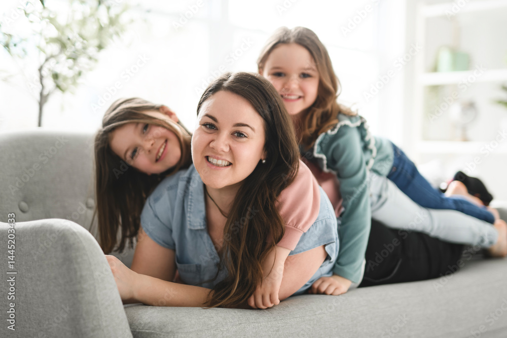 Portrait Of Loving Family Of Mom And two daughter Portrait Of Loving Family Of Mom And two daughter