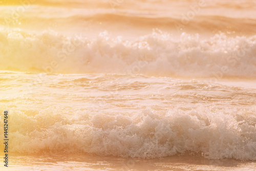 Riplpe sea ocean water surface with small waves. Close up of sea foam from breaking wave. Beautiful nature seascape