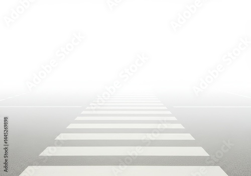 Obraz na płótnie White pedestrian crossing on a road in the fog. Driving in low visibility conditions. Danger on highway concept for road safety campaigns and public awareness. w salonie
