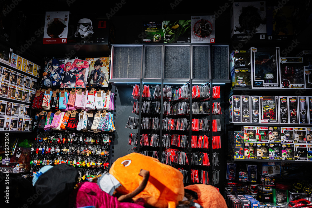 Naklejka premium Anime and superhero merchandise displayed in a colorful collectible shop