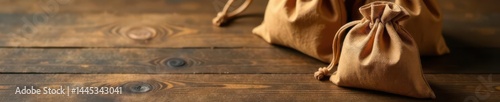 Obraz na płótnie Rustic brown fabric pouch, drawstring closure, soft texture, cotton, vintage w salonie