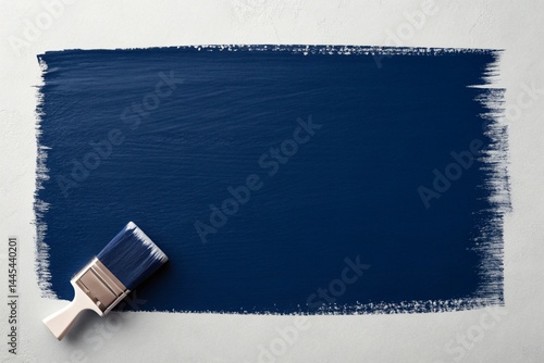 Dark Blue Paint Swatch with Brush on Textured Background