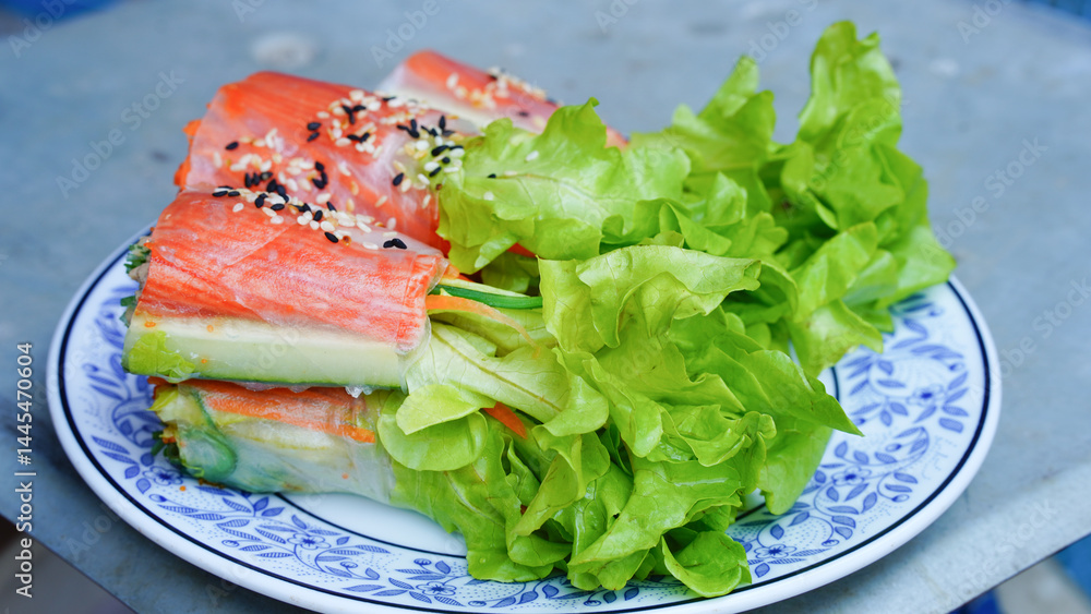 Fresh vegetable salad roll with crab stick eating with spicy salad dressing Fresh vegetable salad roll with crab stick eating with spicy salad dressing