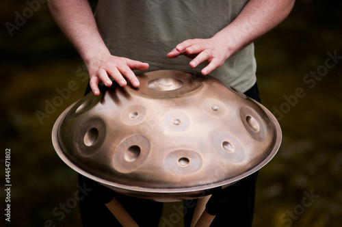 handpan outdoors near a waterfall