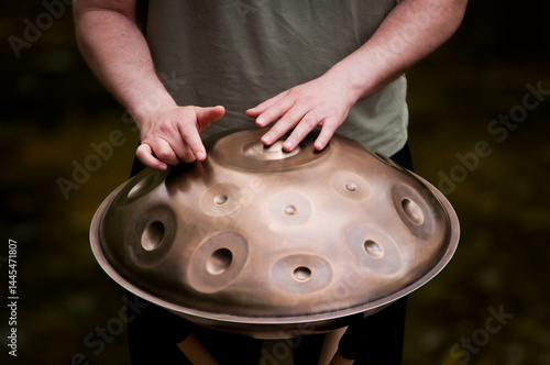 handpan outdoors near a waterfall
