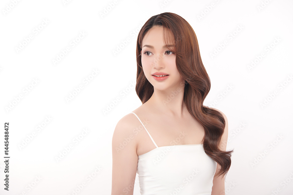 A beautiful young Asian woman with clean, fresh skin against a white background. Skincare, facial treatment, cosmetology, beauty, and spa. An elegant portrait of an Asian woman. A beautiful young Asian woman with clean, fresh skin against a white background. Skincare, facial treatment, cosmetology, beauty, and spa. An elegant portrait of an Asian woman.