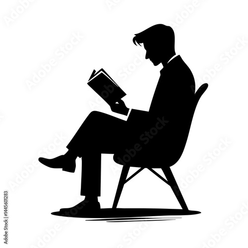 Silhouette of a Man Reading a Book: Peaceful Moments