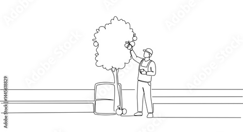 Gardener trimming tree in urban environment  