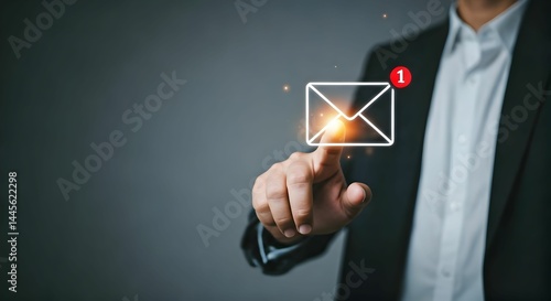 Businessman Touching Digital Email Icon with Notification Alert on Dark Gray Background – Concept of Communication and Technology – Copy Space