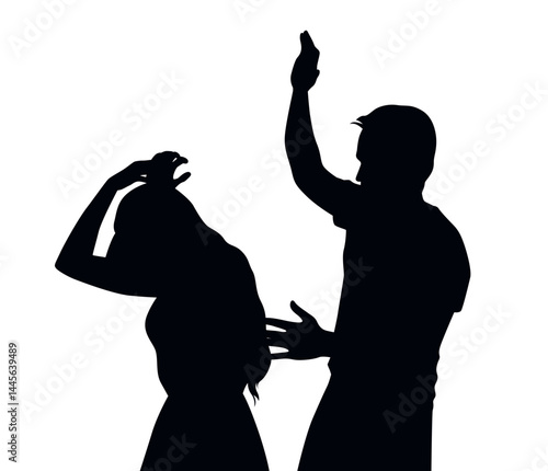 Vector black silhouette of a domestic violence victim protecting herself and her angry attacker raising his hand to punch her isolated on white background