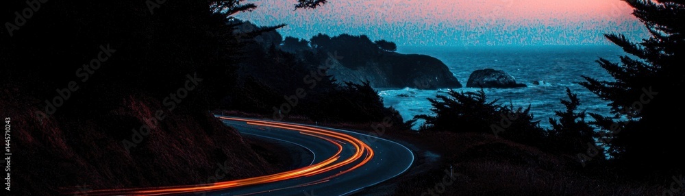Coastal Road With Vehicle Lights Streaking Along Its Curves