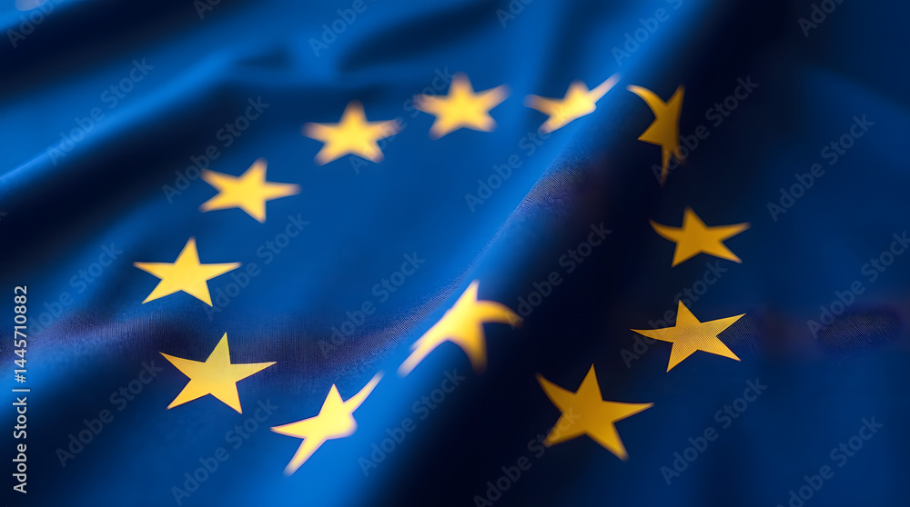 Close-up of the European Union flag, featuring golden stars on a blue background, symbolizing unity and cooperation among member states. Close-up of the European Union flag, featuring golden stars on a blue background, symbolizing unity and cooperation among member states.