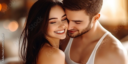 Young couple in romantic embrace with man kissing woman on cheek, both smiling in cozy living room setting