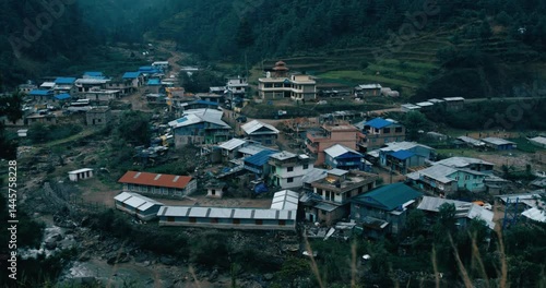 Small village nestled in the Himalayan foothills, ideal for travel brochures, websites, and articles about scenic destinations and rural life.