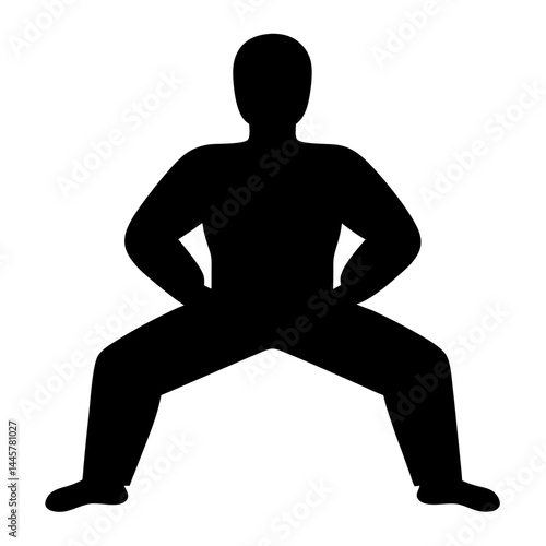 Silhouette of a person in a wide legged stance with hands on thighs