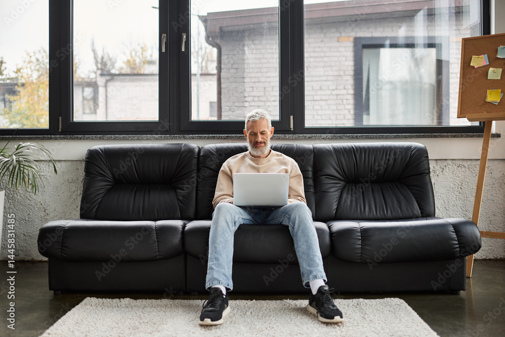 Obraz premium Engaging in productive remote work from a cozy office space with a laptop