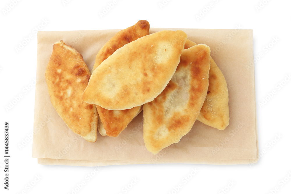 Delicious fried pyrizhky (stuffed pies) isolated on white, top view Delicious fried pyrizhky (stuffed pies) isolated on white, top view
