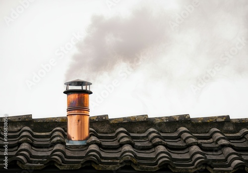 White Smoke Signals Papal Election from Copper Chimney on Vatican Rooftop