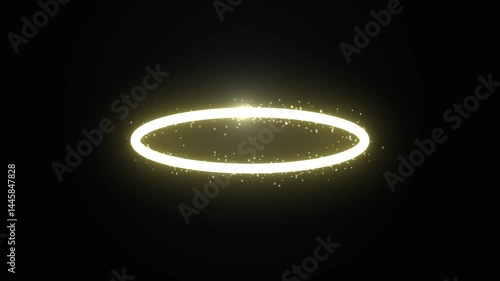 Yellow glowing circle with shimmering particles on a dark background. Halo animation. Use blend modes to make the background transparent.