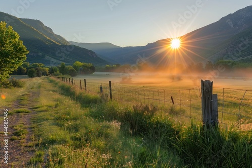 Sunrise Over Misty Mountain Valley