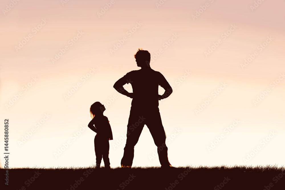 Little Toddler Child Looking up to Her Super Hero Father in Admiration Little Toddler Child Looking up to Her Super Hero Father in Admiration