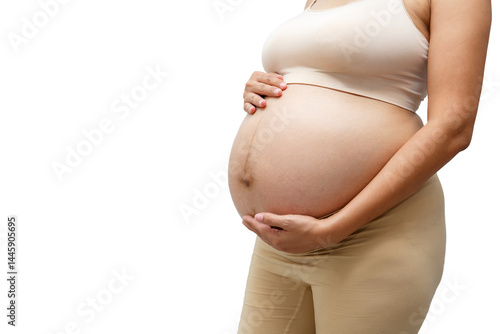Portrait of a pregnant woman touching her big belly close up, mother, pregnancy, people and expectation. Woman holding big pregnant stomach