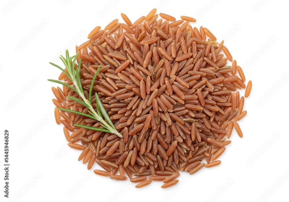 Pile of red rice grains with a sprig of rosemary on a white background Pile of red rice grains with a sprig of rosemary on a white background