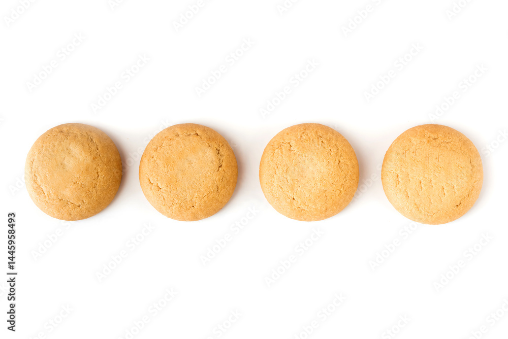 Row of round cookies on white background. Light cookies, shortbread cookies