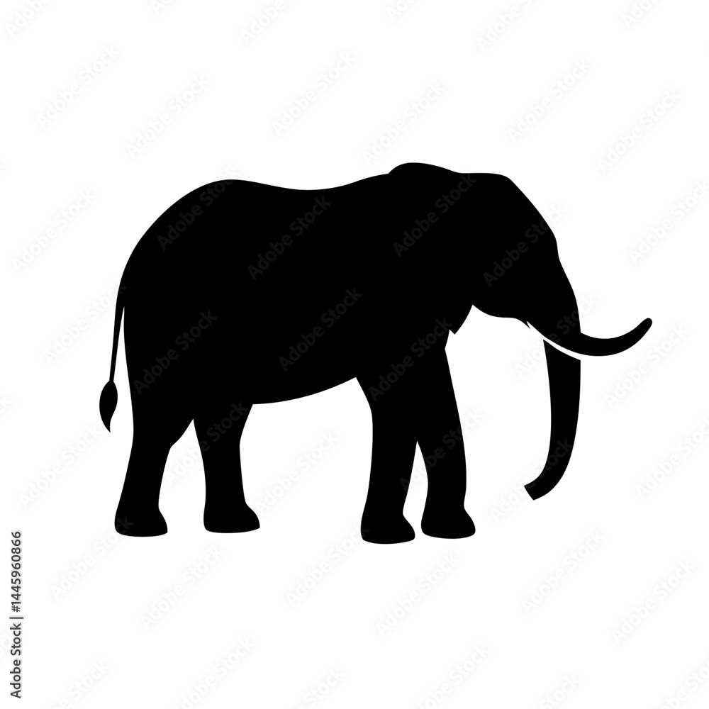 Fototapeta premium Silhouette of a black elephant with tusks and trunk raised