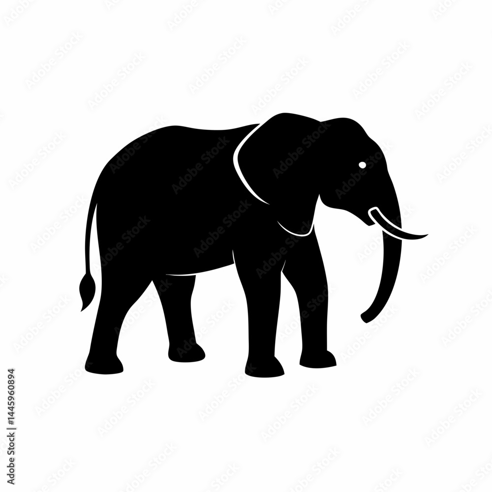 Fototapeta premium Silhouette of a black elephant with tusks and trunk raised