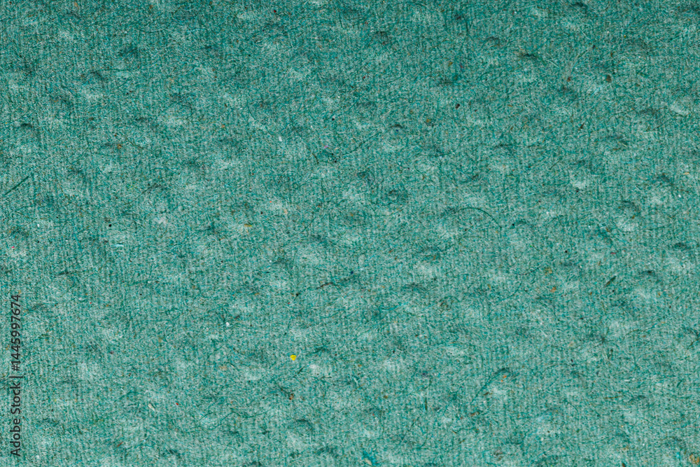 Green paper texture, recycled cardstock. Old crumpled recycled paper of old crumpled recycled paper