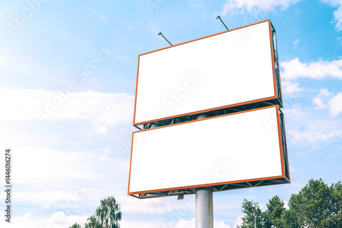 Blank double mockups, billboard on sky background.