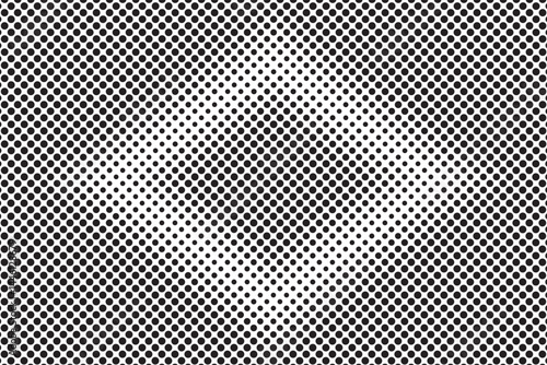 Halftone pattern design with black dots in a grid creating gradient shading depth and textured surface effect backdrop and background