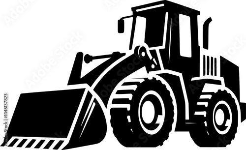 Robust black silhouette of a powerful wheel loader.
