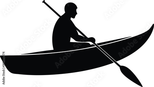 silhouette of a person in canoe paddling 