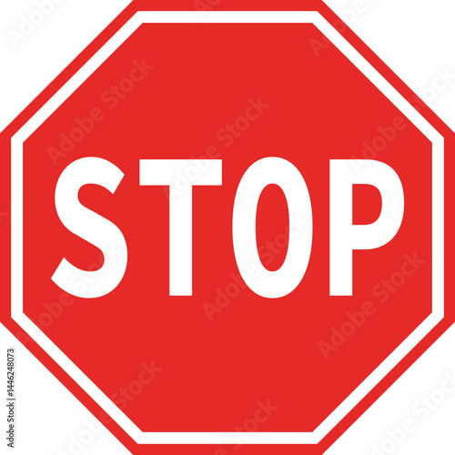 Polygonal road sign in red displaying the word "STOP" in English.