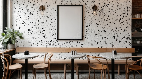 Obraz na płótnie Interior cafe seating area with terrazzo accents and blank frame w salonie