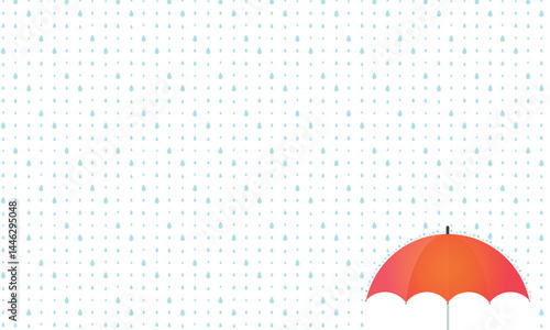 隅にある赤い傘に雨が降って弾いている小さい雨模様
