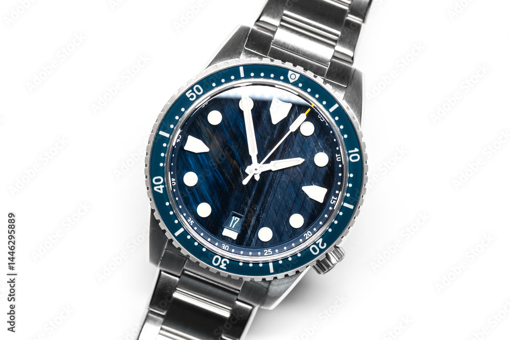 Stylish dive watch featuring a striking blue patterned stone dial in steel case