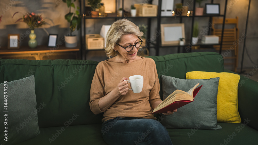 Obraz premium One woman mature caucasian female read book at home wear eyeglasses
