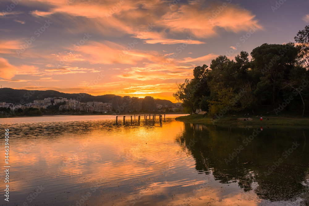 Sunset over the Parku i Madh Lake in the Grand Park of Tirana, Albania