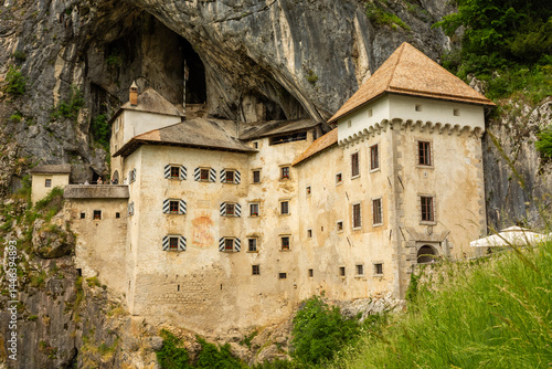 Obraz na płótnie Predjama Castle or Castel Lueghi built within a cave near Postojna. Renaissance castle built within a cave mouth in Slovenia. w salonie