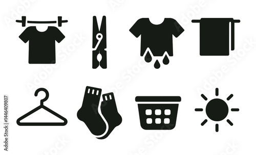 Laundry essentials solid icon set – silhouette wash and care symbols for home organization: drying rack, clothespin, wet shirt, towel, hanger, socks, laundry basket, sun