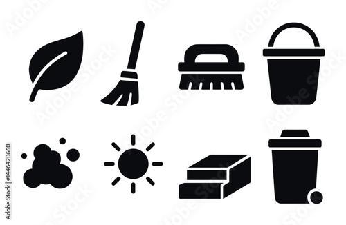 Eco-friendly cleaning icon set – solid style for sustainable hygiene and green living: leaf, broom, brush, bucket, bubbles, sun, sponge, trash can.
