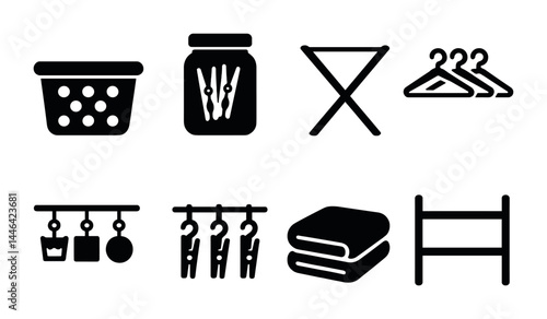 Laundry room icon set – solid style cleaning and organization symbols for home management: basket, clothespin jar, drying rack, hangers, iron board, towels