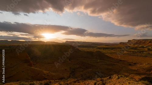 Timelapse wide angle shot of desert sunset at Capitol Reed National Park in Utah, USA