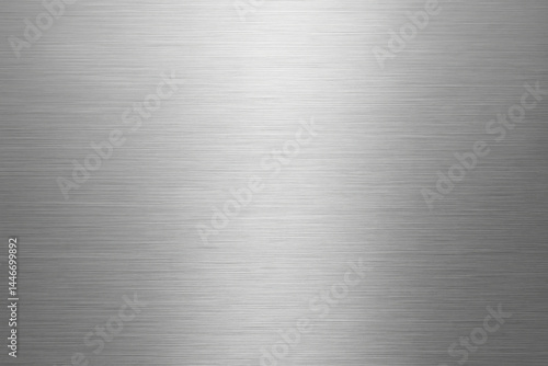 Brushed Metal Surface: A close-up shot of a textured metallic surface, revealing a polished, industrial aesthetic with subtle light reflection and depth. 