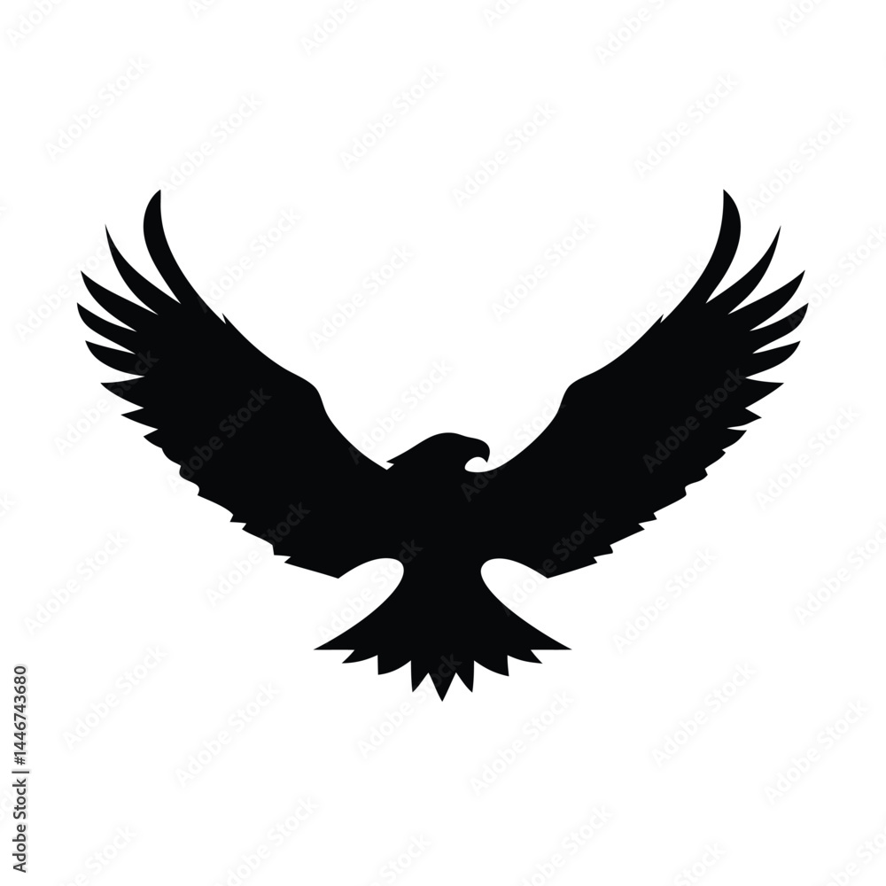 Fototapeta premium Silhouette of an eagle flying with spread wings on a white background