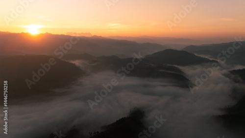 Clouds on high mountain peaks in the rainy season in the Asian rainforest.	